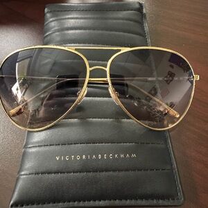 Victoria Beckham gold hammered aviators